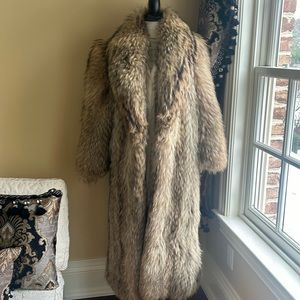 Full length tunuki fur coat liner has some rips